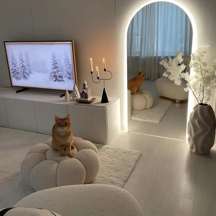 Fauteuil pivotant en laine bouclée