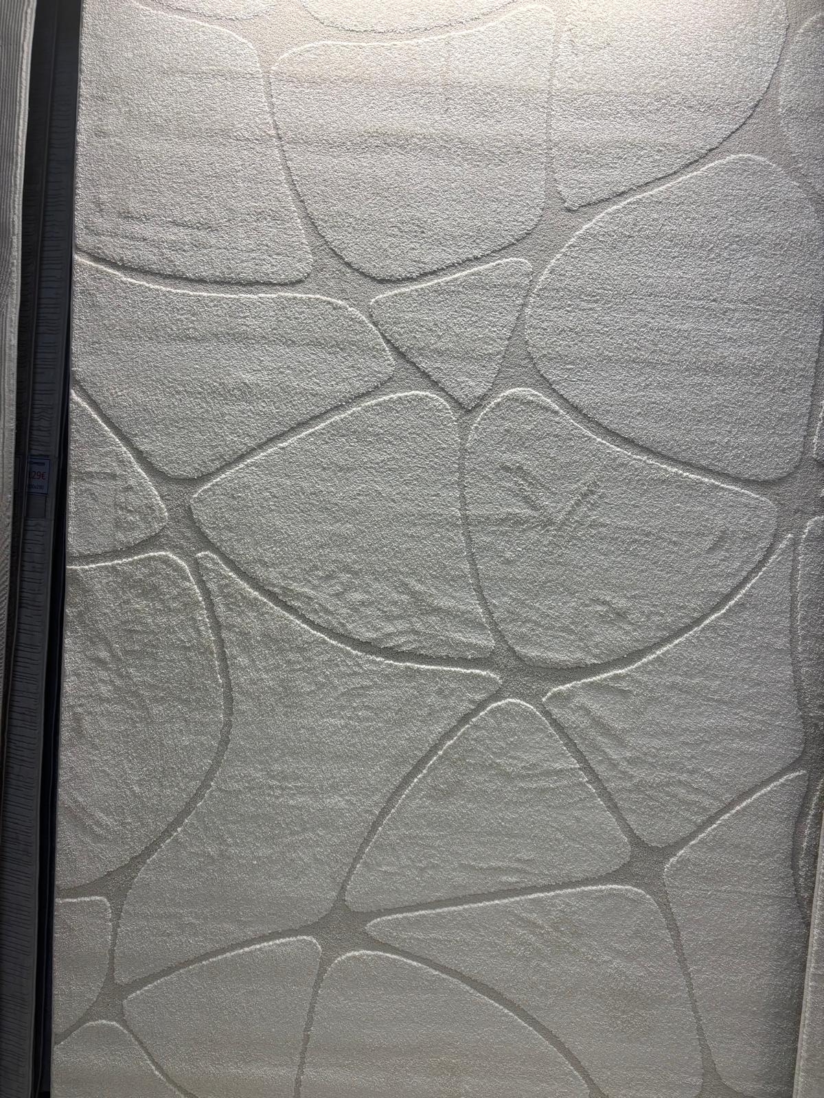 Tapis Elio crème Merinos – Confortable et Sobre Design Galet